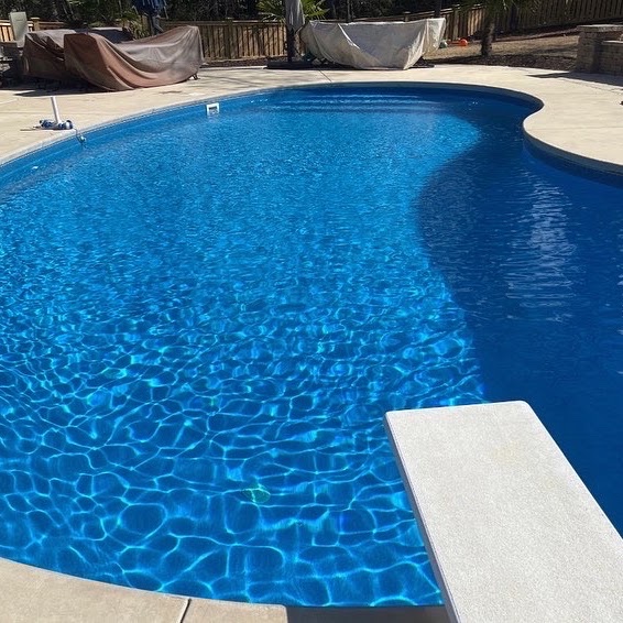 Blue residential pool after service.